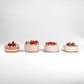 Delicious Four Strawberry Cakes With Cream Layers And Fresh Red Toppings On White Background
