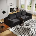 Black Two Seater Sofa In Living Room With Floor Lamp Geometric Rug And Coffee Table