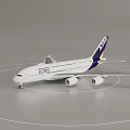 White A380 Airplane Model With Blue Tail Fin And Brand Logo On Gray Background