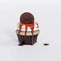 Delicious Cupcake With Oreo Cookie Dripping Red Sauce And Cream Layers In Dark Paper Liner