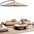 Comfortable Outdoor Sofa on Wooden Deck with Round Coffee Table and Cantilever Umbrella