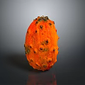 Orange Kiwano Fruit With Spiky Exterior And Black Protrusions On Gray Background With Reflection