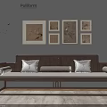Chinese Style Wooden Sofa Set With Gray Cushions Framed Paintings And Vase On Gray Wall