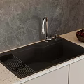 Modern Black Kitchen Sink With Drainer Silver Faucet Marble Backsplash And Fruit Bowl On Countertop