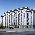 Modern Office Building Exterior With Multiple Glass Windows Flat Roof Front Entrance And Landscaping