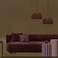 Burgundy Velvet Two-Seater Sofa With Plush Pillows Maroon Pendant Lights And Pink Cylindrical Side Tables