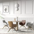 Modern Dining Table Set With Colored Chairs White Wall Art Spherical Pendant Light And Plant