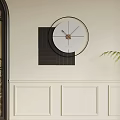 Black White Geometric Clock On Off White Wall With Wrought Iron Arch And Green Plant