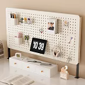 Home Office Interior With Pegboard Drawer Cabinet Clock Headphones And Organizational Items