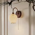Elegant Wall Lamp with Brass Bracket Wooden Base Cream Lampshade on Light Wall