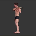 Shirtless Man In Black Shorts Holding Stick Performing Exercise On Dark Background With Reflective Floor