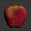 Fresh Red Apple with Yellow Stripes Shiny Surface Brown Stem Dark Background Juicy and Ripe
