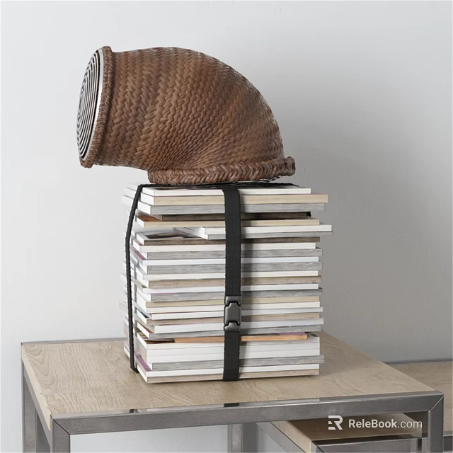 Stacked Books Tied with Black Belt and Woven Basket on Wooden Table 3d model 