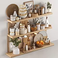 Various Kitchenware Arranged on Wooden Shelves with Bowls Plates Jars Bottles and Decorative Plants