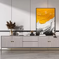 Modern TV Stand with Textured Doors and Gold Handles Featuring Decorative Painting and Vase in Living Room