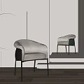 Modern Beige Accent Chairs With Curved Design And Black Metal Legs In Minimalist Showcase