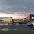 Modern School Building With Glass Facade Sunset Sky Cars And Green Grass Lawn