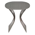 Modern Metallic Side Table With Curved Legs And Textured Round Top