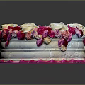 Beautifully Decorated Cake With Pink And White Cream Roses On Top