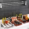Essential Kitchen Utensils with Wall Mounted Rack Condiments Knives and Cutting Board on Countertop