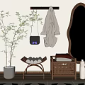 Modern Entryway With Curved Mirror Coat Rack Plant Stool And Geometric Rug