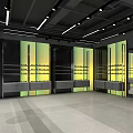 Modern Retail Display Space With Black Cabinets Yellow Green Lighting And Mirror Reflections