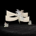 Elegant Floral Installation With Beige Pleated Fabric And Light Colored Flowers Feather Accents