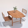 Wooden Oval Dining Table Set with Mesh Back Brown Seats Metal Leg Chairs Green Plant