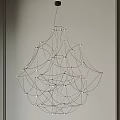Modern Abstract Chandelier Interior Design With Metal Wire Structure Intertwined Lines And LED Lights