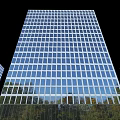 Modern High Rise Office Building With Glass Facade And Reflective Tree Reflections
