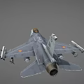 Military Fighter Jet With Gray Camouflage Paint Golden Nose Cone Mounted Missiles And Wing Markings