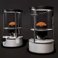 Industrial Equipment Gas Heaters with Metal Mesh Covers White Bases and Orange Heating Elements