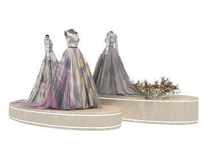 Elegant Long Dresses On Three Mannequins With Circular Platforms And Decorative Floral Accents 3d model