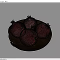 Four fresh ripe pomegranates in black bowl on light blue background