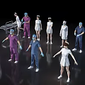 Group of Medical Professionals in Different Colored Uniforms Standing Together
