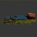 Blue Textured Cloth With Brown Container And Green Plants On Furry Base