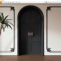 Black Double Doors With Circular Knocker Arched Frame Black Decorative Trim And Green Palm Plant