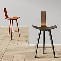 Modern Leisure Chairs With Wooden Metal Frames On Light Wooden Floor And White Wall