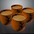 Four Orange Textured Mugs With Foamy Liquid For Daily Household Use