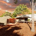 Outdoor Camping Tents in Red Rocks Area with Trees and Sunset Sky