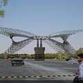 Modern Entrance Gate With Mesh Design LOGO Cars People And Trees Around