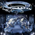 Luxurious Banquet Hall With Starry Theme Backdrop Decorative Chandeliers And Flower Walkway