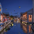 Ancient Architecture Night View With Waterway Floating Lanterns And Lit Buildings Reflections