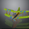 Space Themed Biplane Model With Green Yellow Blue Design And Propeller Cockpit