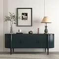Dark Entryway Console Table with Vase Plants Framed Art and Table Lamp against Light Wall