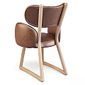 Modern Brown Leather Single Chair With Rounded Backrest Armrests And Wooden Legs
