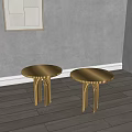 Black Round Top Side Tables With Three Slim Legs And Textured Surface Design