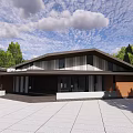 Modern Sloped Roof Building Design With Surrounding Trees Blue Sky And Paved Square