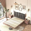 Double Bed with Black Leather Headboard White Floral Sheets and Wooden Nightstand