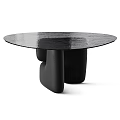 Modern Round Dining Table With Glass Top And Sculptural Base Design For Contemporary Spaces